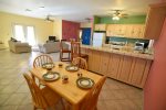 El Dorado Ranch mountain side rental - dining table with living ara view
